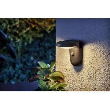 Aplica LED solara pentru exterior cu senzor de lumina si miscare Philips Tyla, 1.2W, 4V, 255 lm, lumina calda (3000K), IP44, 188x158x184mm, Antracit